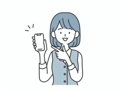 スマホを指差す受付の女性