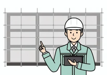 指示をしているタブレットを持った現場監督