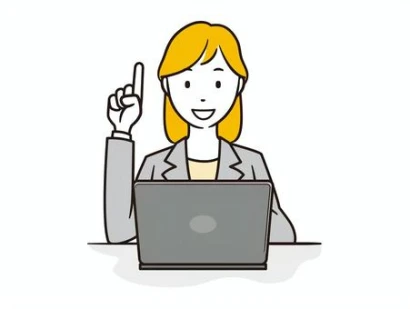 パソコンを操作しながらポイントを示すOL