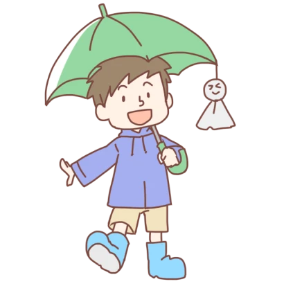 緑の傘をさした男の子